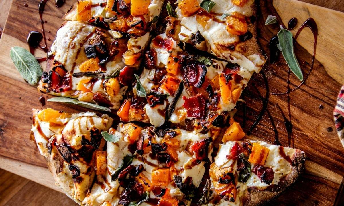 Protein-crust Pizza with Butternut Pumpkin, Bacon, and Caramelised Oni — Ooni New Zealand
