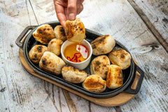 Dough balls with hot honey sauce