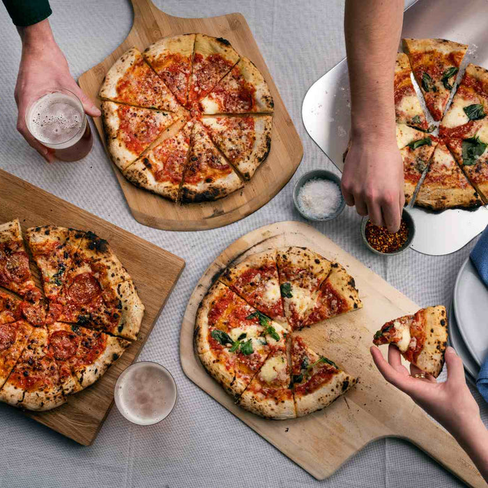 How to Bake Pizza for a Crowd: Tips for Cooking Multiple Pizzas and Recovering from Epic Fails