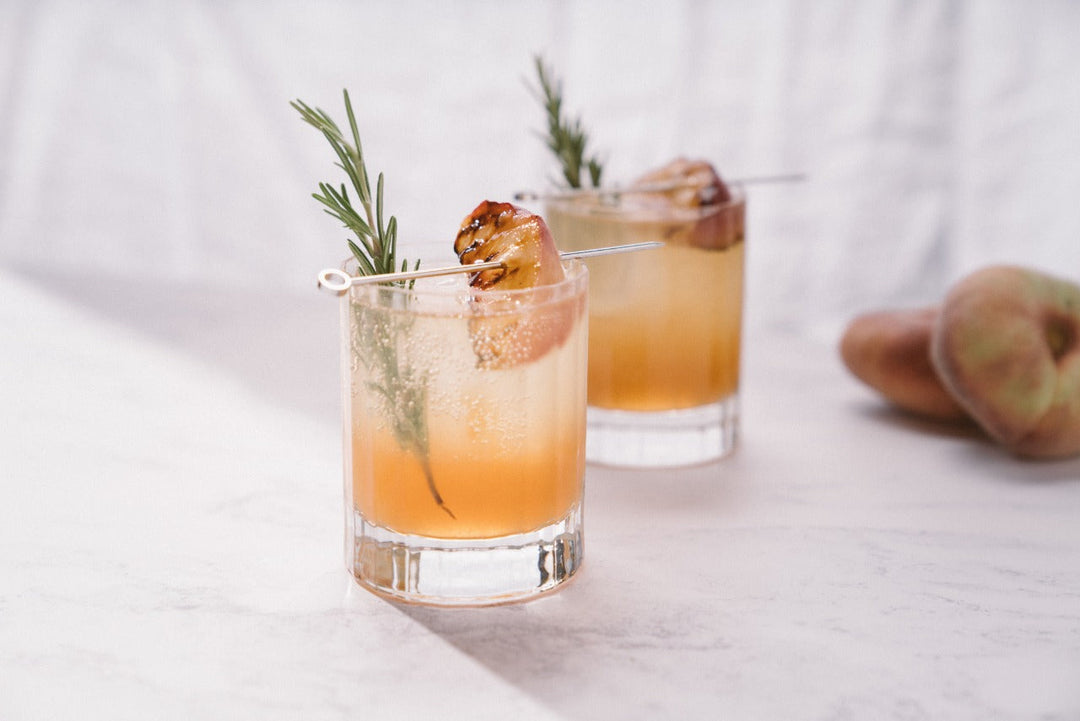 Smoky Peach and Rosemary Bourbon Spritz