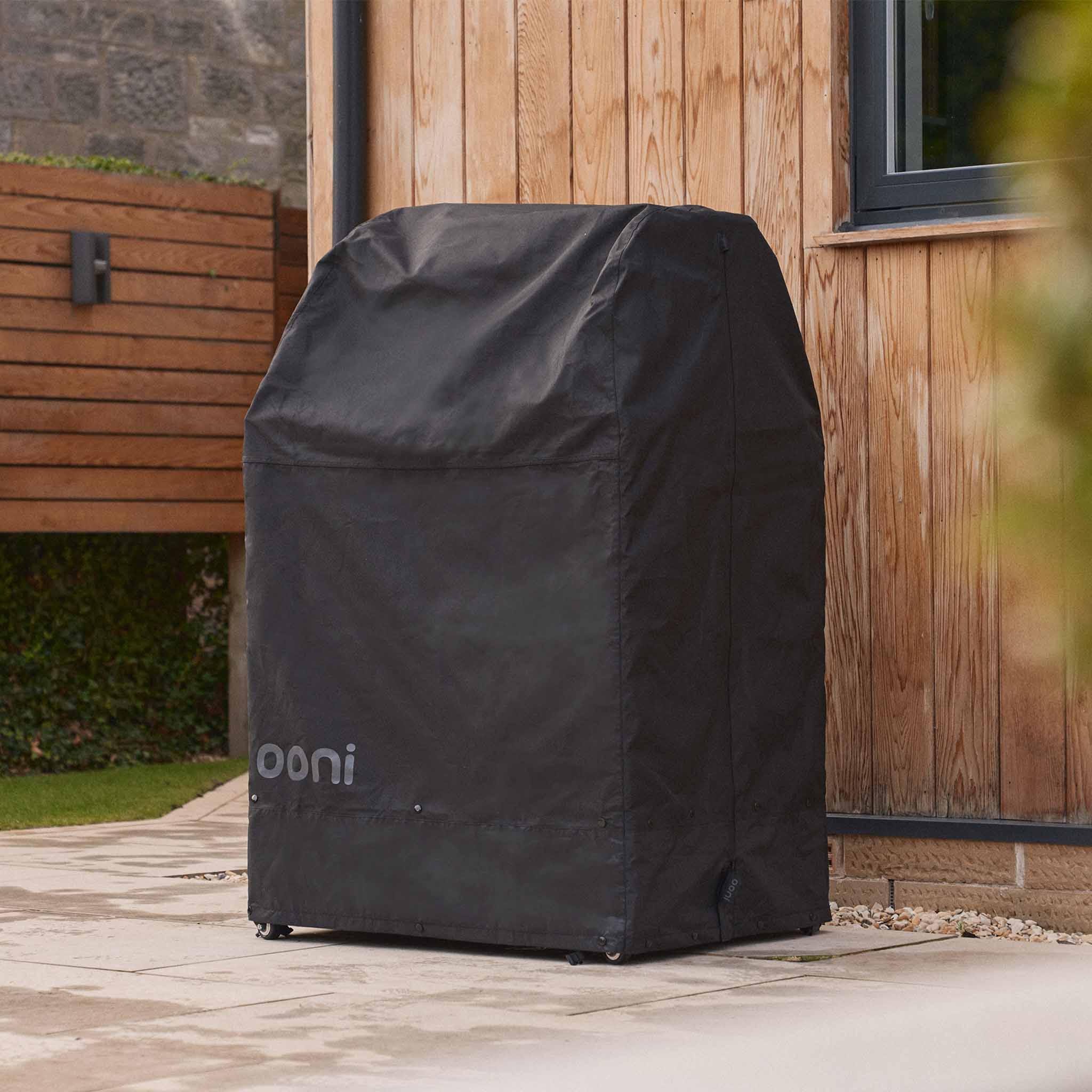 Medium version of the Ooni Table and Oven cover in an outdoor setting