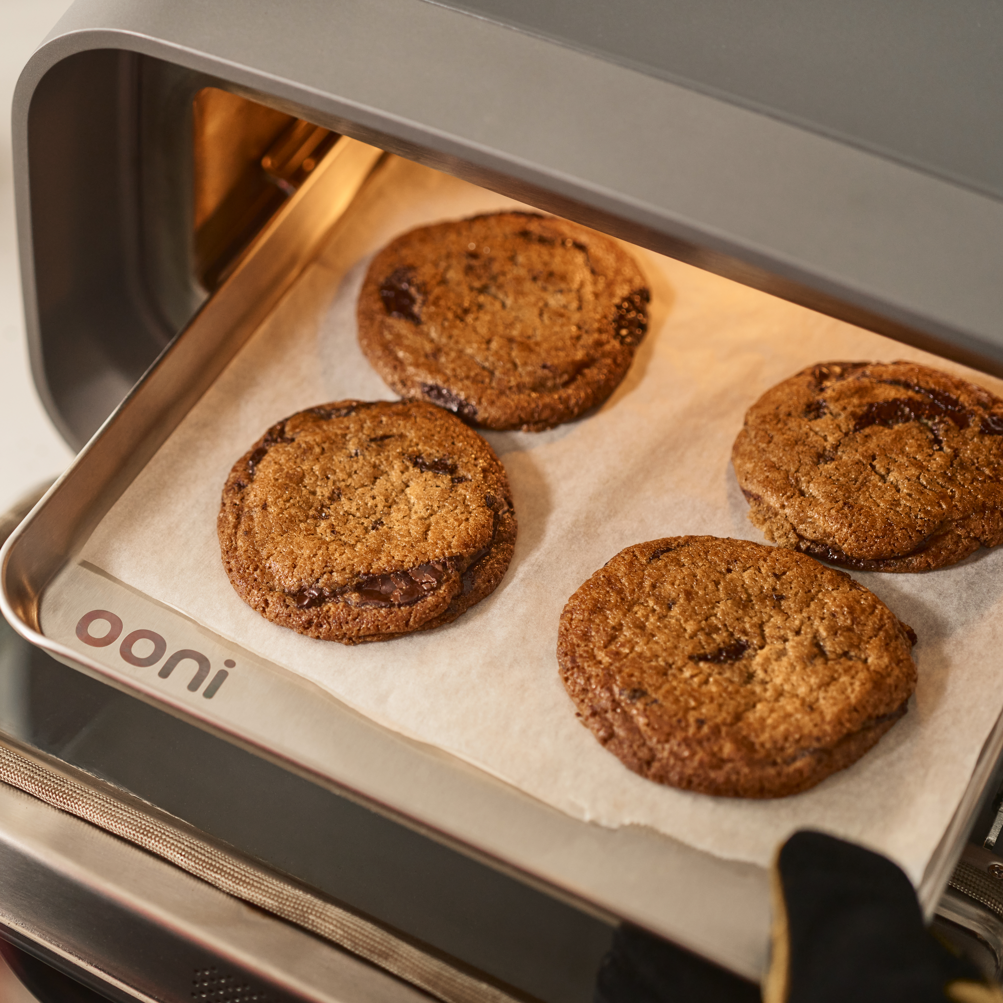 cooking baking in ooni volt 2 electric pizza oven on ooni sheet pan 
